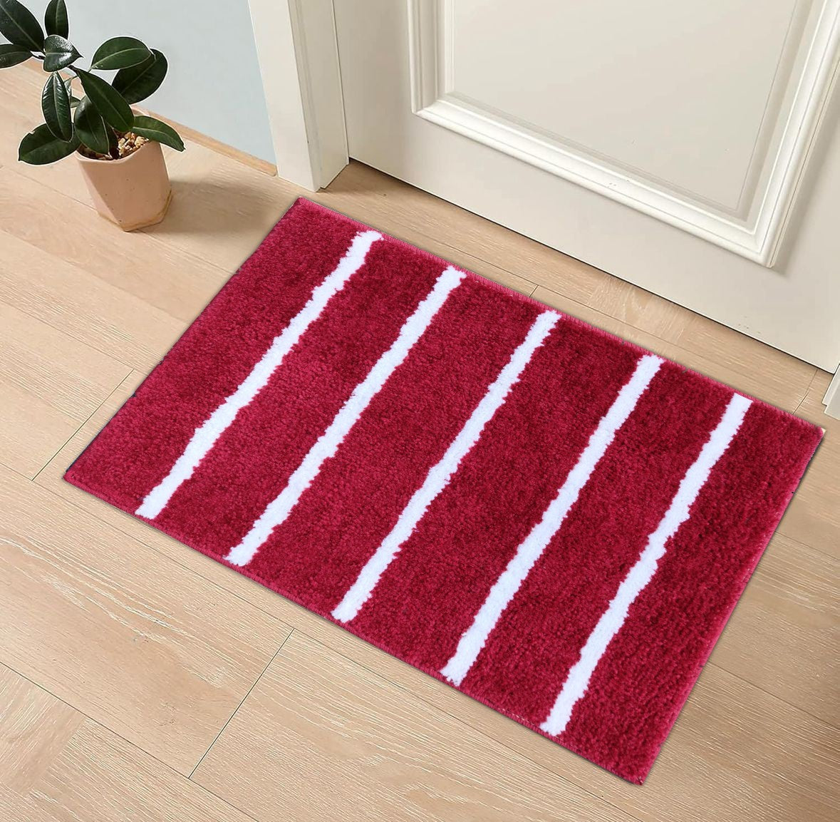 Modern Rug - Red microfiber stripe bathmat placed on wooden floor, enhancing bathroom aesthetics.